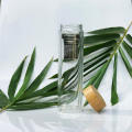 Bouteille en verre avec couvercle en bambou LOGO personnalisé avec infuseur à thé bouteille d&#39;eau en verre à double paroi